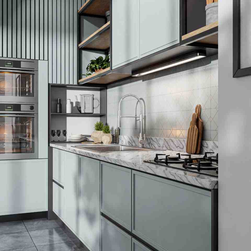 Kitchen with sage green shaker cabinets, marble countertops, and stainless double wall ovens